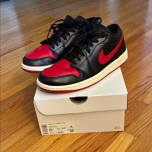 Nike Women’s Air Jordan Low Black/Gym Red/Sail Sneakers